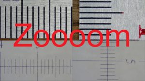 Measuring minimal and maximal microscope magnification and zoom ratio